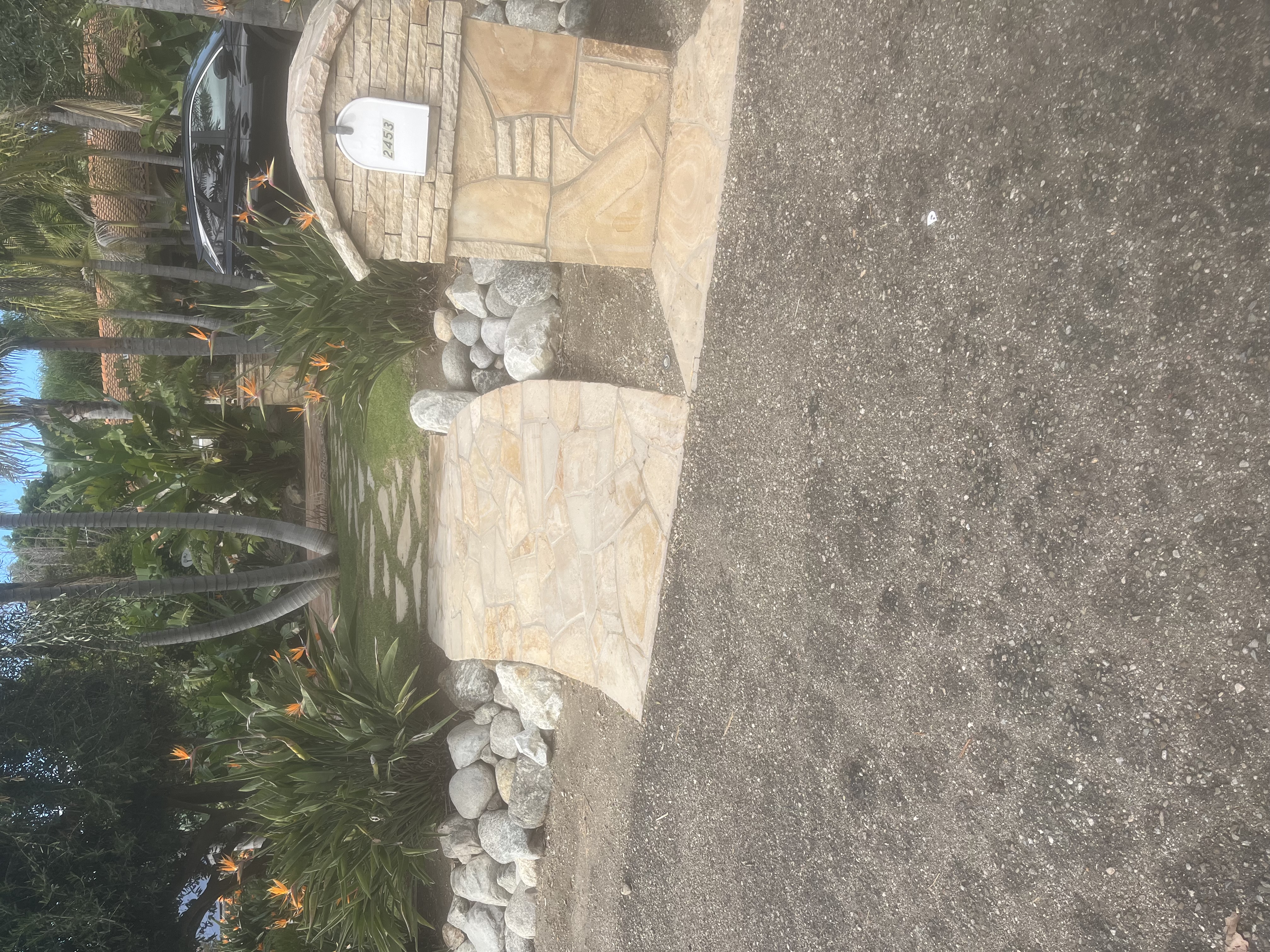 Stone mailbox with flagstone apron